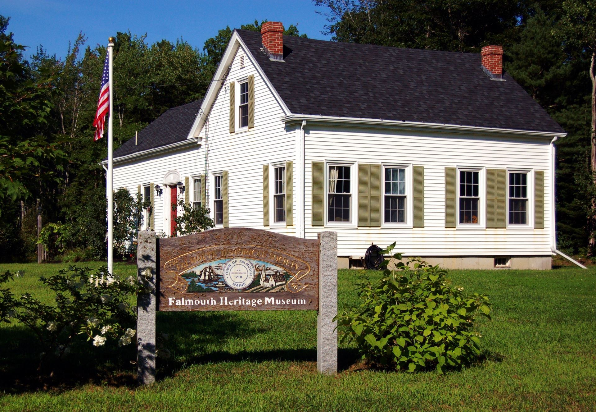 Falmouth Heritage Museum with Old Sign